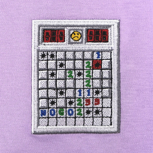 Close-up photograph of minesweeper embroidery design
