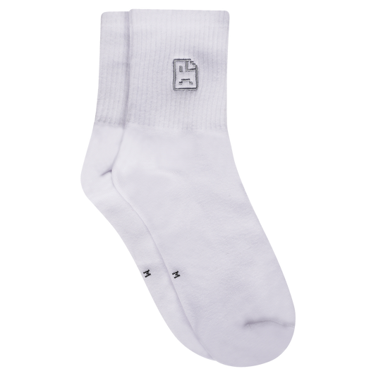 Photograph of white socks with sad face embroidery design