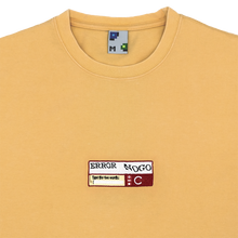 Load image into Gallery viewer, Collar-shot photograph of yellow tshirt with captcha embroidery design
