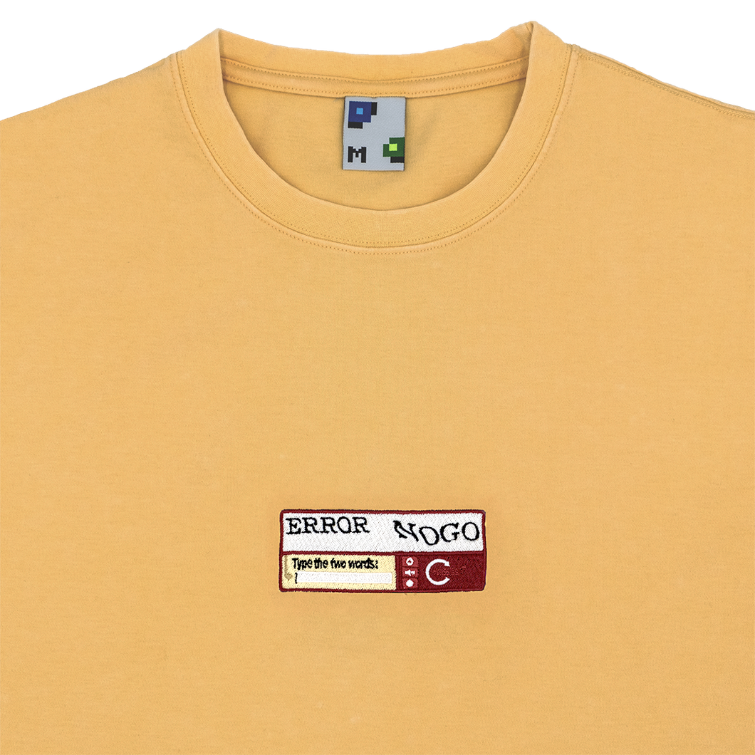 Collar-shot photograph of yellow tshirt with captcha embroidery design