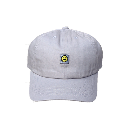 Photograph of grey minesweeper cap with embroidered sad face design