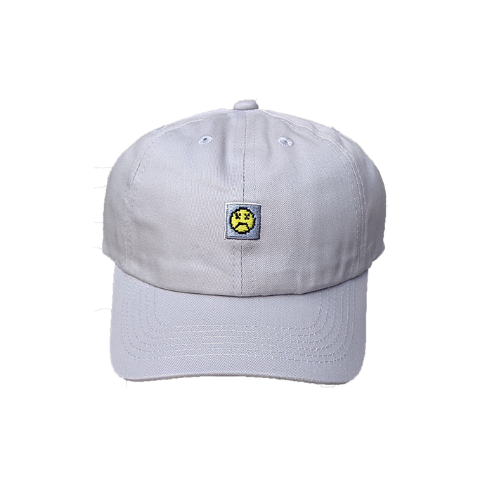Photograph of grey minesweeper cap with embroidered sad face design