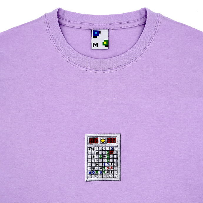 Photograph of purple tshirt with minesweeper embroidery design