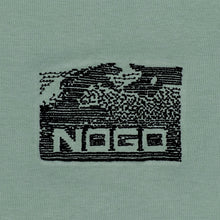 Load image into Gallery viewer, Close-up photograph of embroidery design that reads nogo

