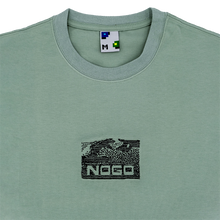 Load image into Gallery viewer, Collar shot photograph of green tshirt with embroidery design that reads nogo
