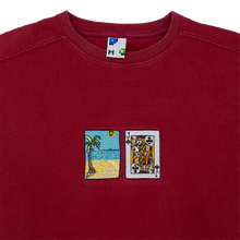 Load image into Gallery viewer, Collar shot photograph of red crewneck with solitaire card embroidery
