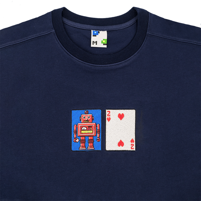 Collar shot photograph of navy blue crewneck with solitaire playing card embroidery
