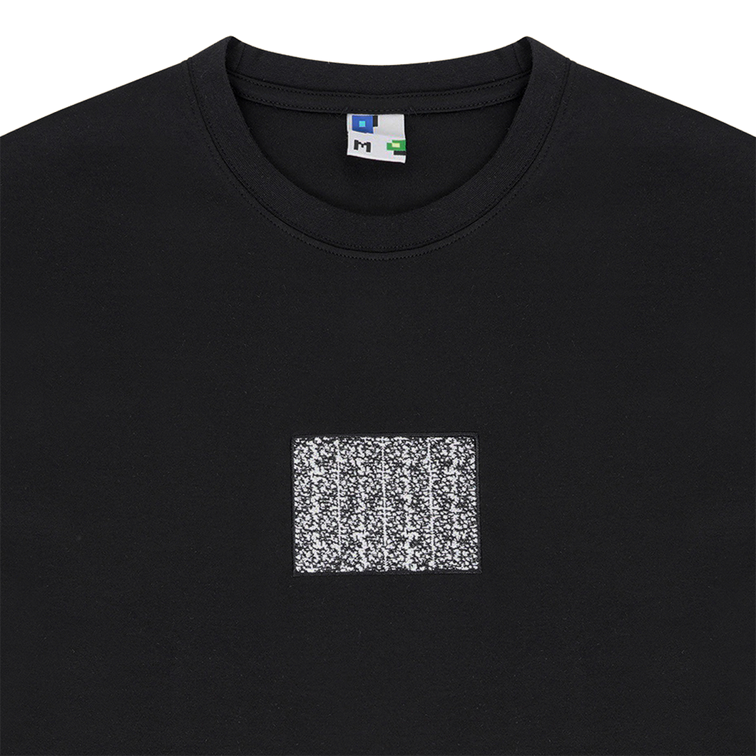 Collar shot photograph of black tshirt with static embroidery in 4:3 ratio